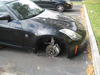 Get wheel lucks if you don't like to see your Z like this one day-img_0595.jpg