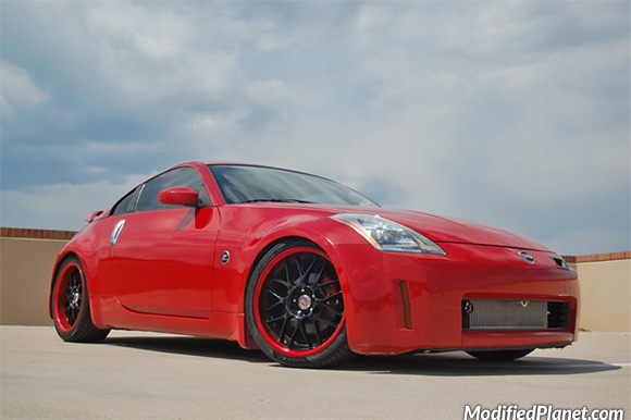 Name:  car-photo-2004-nissan-350z-enthusiast-19-inch-xxr-006-black-wheels-with-red-lip-eibach-.jpg
Views: 1093
Size:  75.4 KB