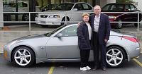 Guess what, my car suddenly arrived at the dealership today!-resizemomdadcar.jpg