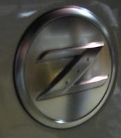 How to remove black paint from side Z emblem?-img_2809.jpg