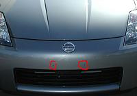 How to cover up the holes the dealership-plateholes.jpg