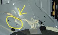 Question for those with amps in the area designed for the factory sub.-ground-point.jpg