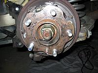 Installing long wheel studs in rear with pics-axlenut.jpg