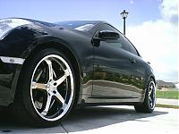 Black BBK's with Black Wheels-driver-side-low-front.jpg