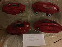 Brand new in box. Complete set of red Akebono Nissan calipers 00.00 shipped-image1.jpg