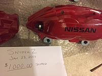 Brand new in box. Complete set of red Akebono Nissan calipers 00.00 shipped-image2.jpg