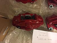 Brand new in box. Complete set of red Akebono Nissan calipers 00.00 shipped-image3.jpg
