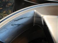 Black stains on wheels - anyway to remove them?-img_0985-800x600-.jpg