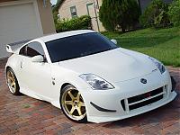 MY 07 PPW WITH FULL V2 BODY KIT AND GOLD VOLK LE37's !!-front.jpg