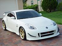 MY 07 PPW WITH FULL V2 BODY KIT AND GOLD VOLK LE37's !!-front-3.jpg