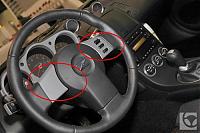 carbon fiber steering wheel pieces?-2005_nissan_350z__interior-steering-wheel.jpg