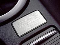 Replacement for this plastic part-07_nismo350z_plaque.jpg