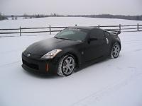 Black Track Veilside V1 lip, wing, and NISMO side skirts and exhaust-veilside-v1-black-track-in-snow.jpg