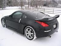 Black Track Veilside V1 lip, wing, and NISMO side skirts and exhaust-veilside-v1-black-track-in-snow-2.jpg