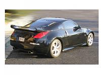 Black Track Veilside V1 lip, wing, and NISMO side skirts and exhaust-veilside-v1-blur-back-round.jpg