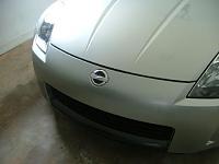 Pre order Courtesy Nissan emblem-hood.jpg