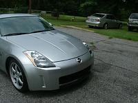 Pre order Courtesy Nissan emblem-lm.jpg