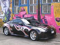 Black Track with Veilside V1 front lip and rear wing, NISMO sides, @ silver flames-tad-s-z-with-flames-in-front-of-cool-mural.jpg