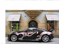 New Body Kit Italian-tad-20z-20with-20flames-20in-20front-20of-20store.jpg