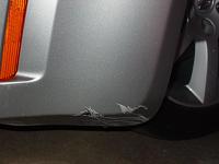 Any idea how much to fix this scrape?-damage2.jpg