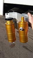 Greddy Manifolds-gold-cans-mounted.jpg