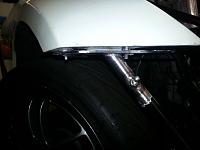 Removal Of The EVAP System-front-bumper-quick-release-tab-passenger-side-closeup.jpg