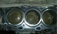 All signs of a full build again-engine-block-ceramic-coated-pistons-installed.jpg