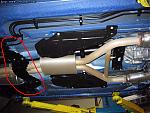 Anyone removed the brace below the exhaust?-metal-part.jpg