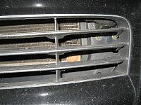 This fell out of my front grill-img_2507.jpg