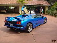 Notice anything in this pic???-lamborghini-and-350z.jpg