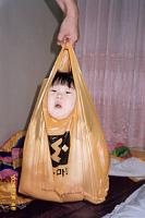 Random Pics..Your Z, other toys, kids, girlfriend, wife, your self....-childinabag.jpg