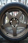 FS OEM 18" G35 Coupe Rims - Also Bronze LMGT4-frontdent.jpg