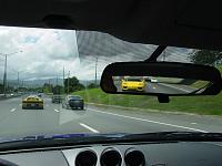 Two Z's and lots of Ferraris-taking-off.jpg