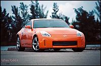 Nicely done pics of my 07 Solar Orange-resized3.jpg