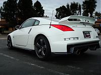 My Nismo w aftermarket tail lights-rear-stock.jpg