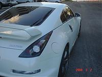 My Nismo w aftermarket tail lights-rear-pass.jpg