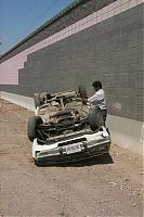 So gay!!-tim-car-roll-over1.jpg