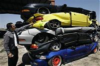 Cars crushed in street racing crackdown-20070620__crushedhotrods-1_gallery.jpg