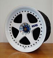 Would someone be so kind to photoshop my wheels black?-nismogt1s.jpg