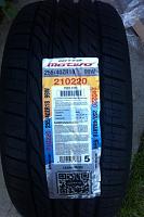 Steve Aoki Autographed Nitto tire. 255/40/18-tire-with-sticker.jpg