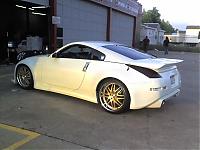 White Z with gold rims..Sighting in Houston.-car1.jpg