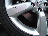 What color paint does Nissan use on the 2006 350z wheels?-dsc00100.jpg