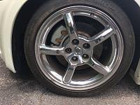 Just learned these aren't stock rims..any ideas?-image.jpeg