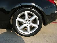 Running wider rubber on stock rims-107-0796_img.jpg