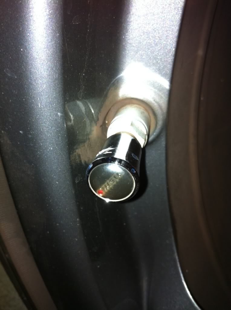How Do You Remove The Plastic Cap Stuck On A Tire Valve?